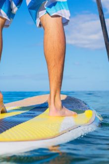 Stand Up Paddler auf dem SUP Board